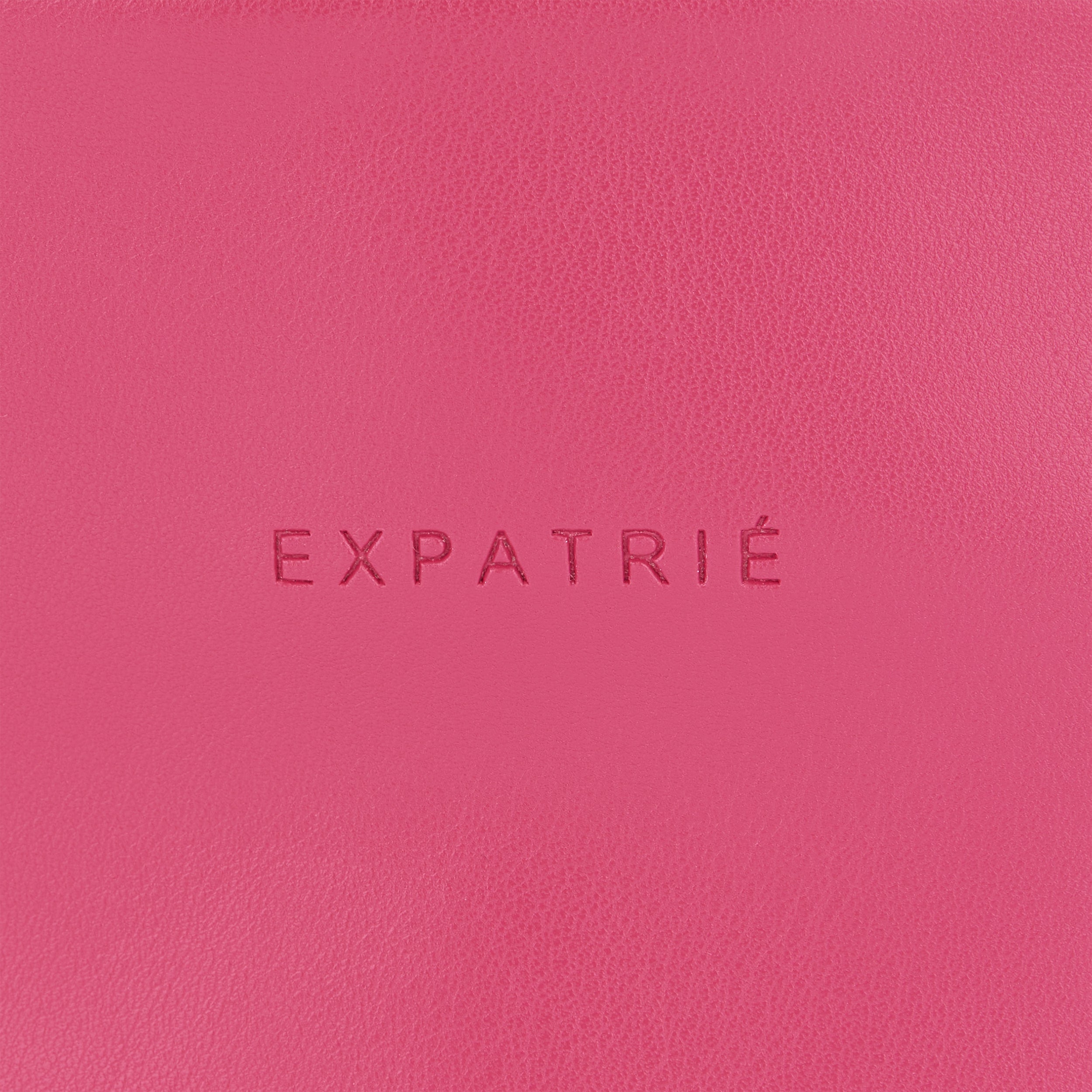 Pinkfarbene Kunstleder-Bauchtasche mit eingeprägtem 'Expatrié' Schriftzug