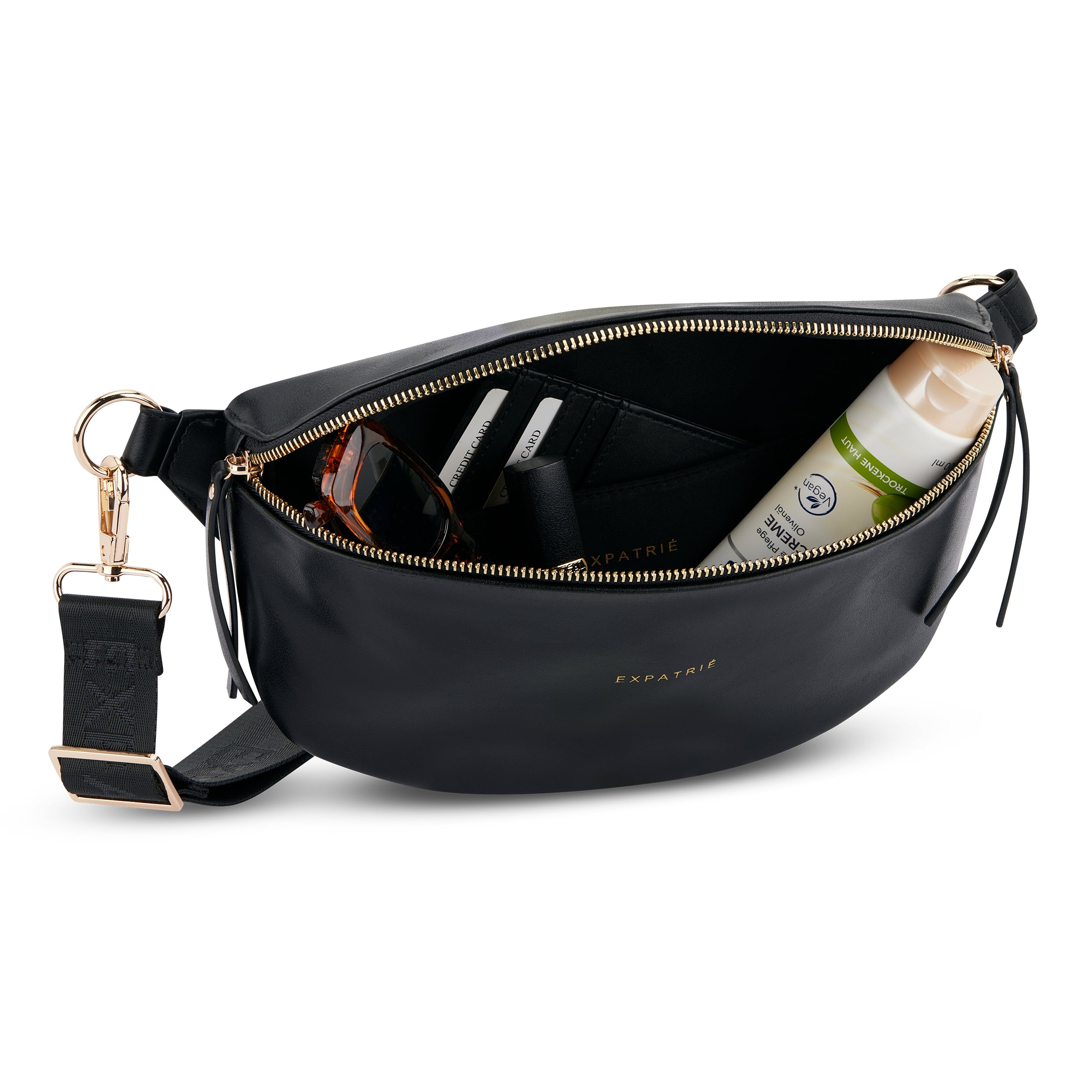 Schwarze Bauchtasche Alice Medium von Expatrié mit goldfarbenem Reißverschluss, Kreditkartenfächern, Sonnenbrille und Creme