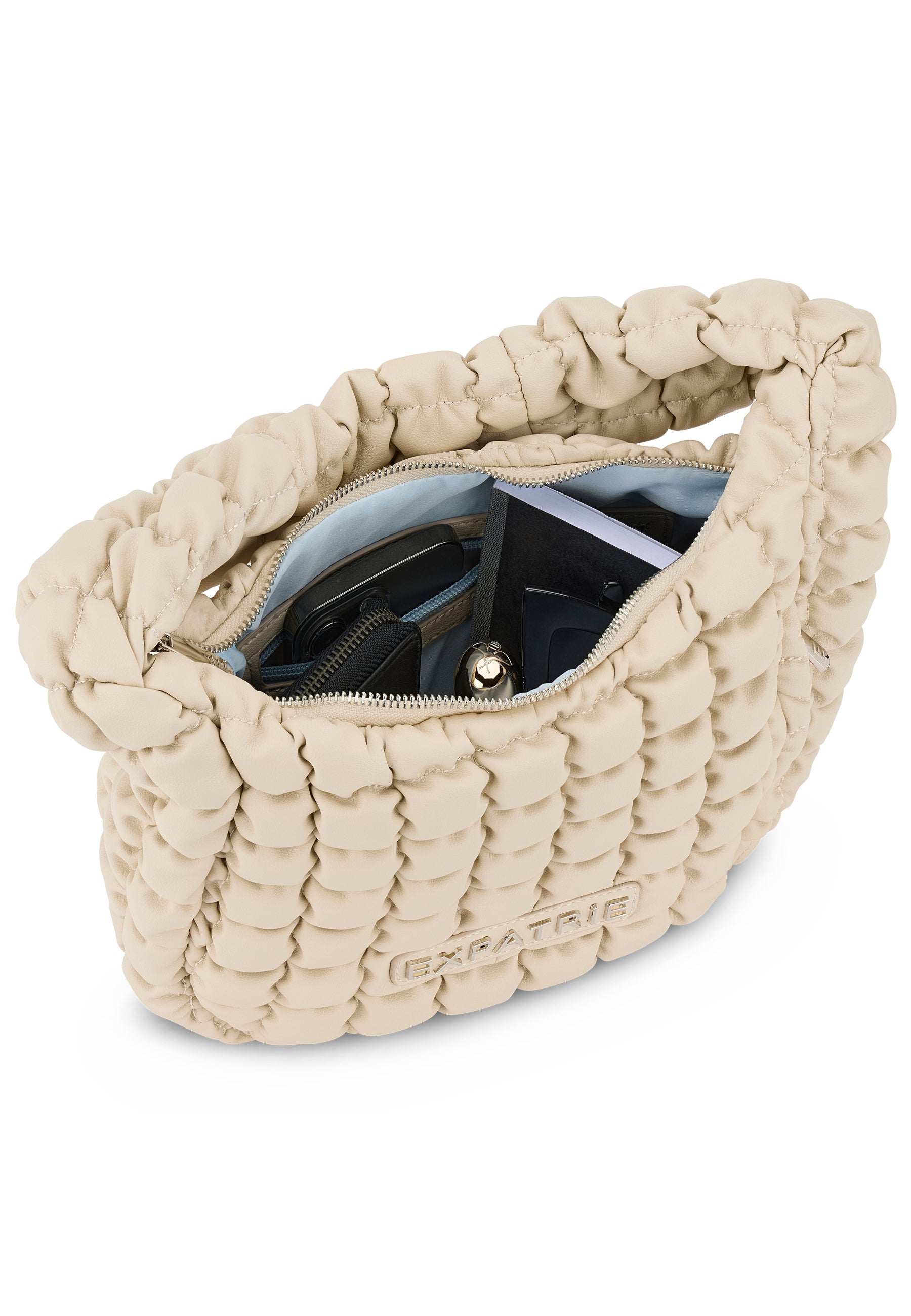Beige PIPPA LARGE Handtasche von Expatrié mit gestepptem Design und Reißverschluss geöffnet, Inhalt sichtbar
