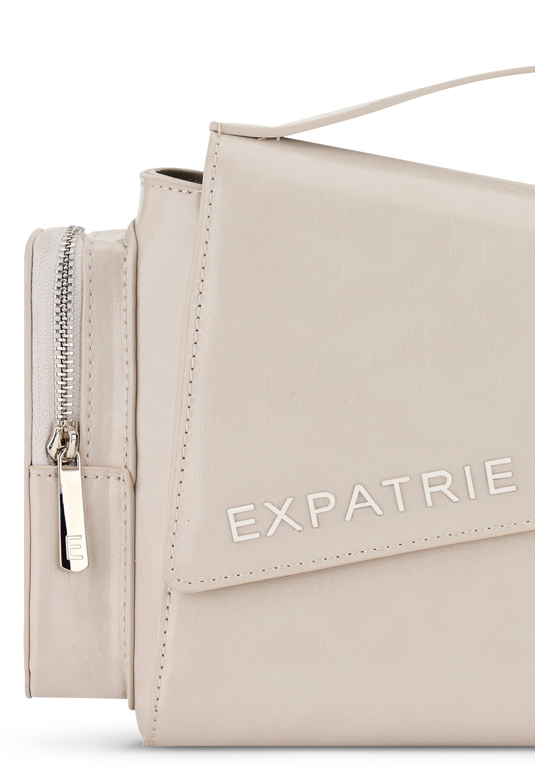Beige HUNTER Handtasche aus Leder mit sichtbarem Reißverschluss und Aufschrift 'EXPATRIE'