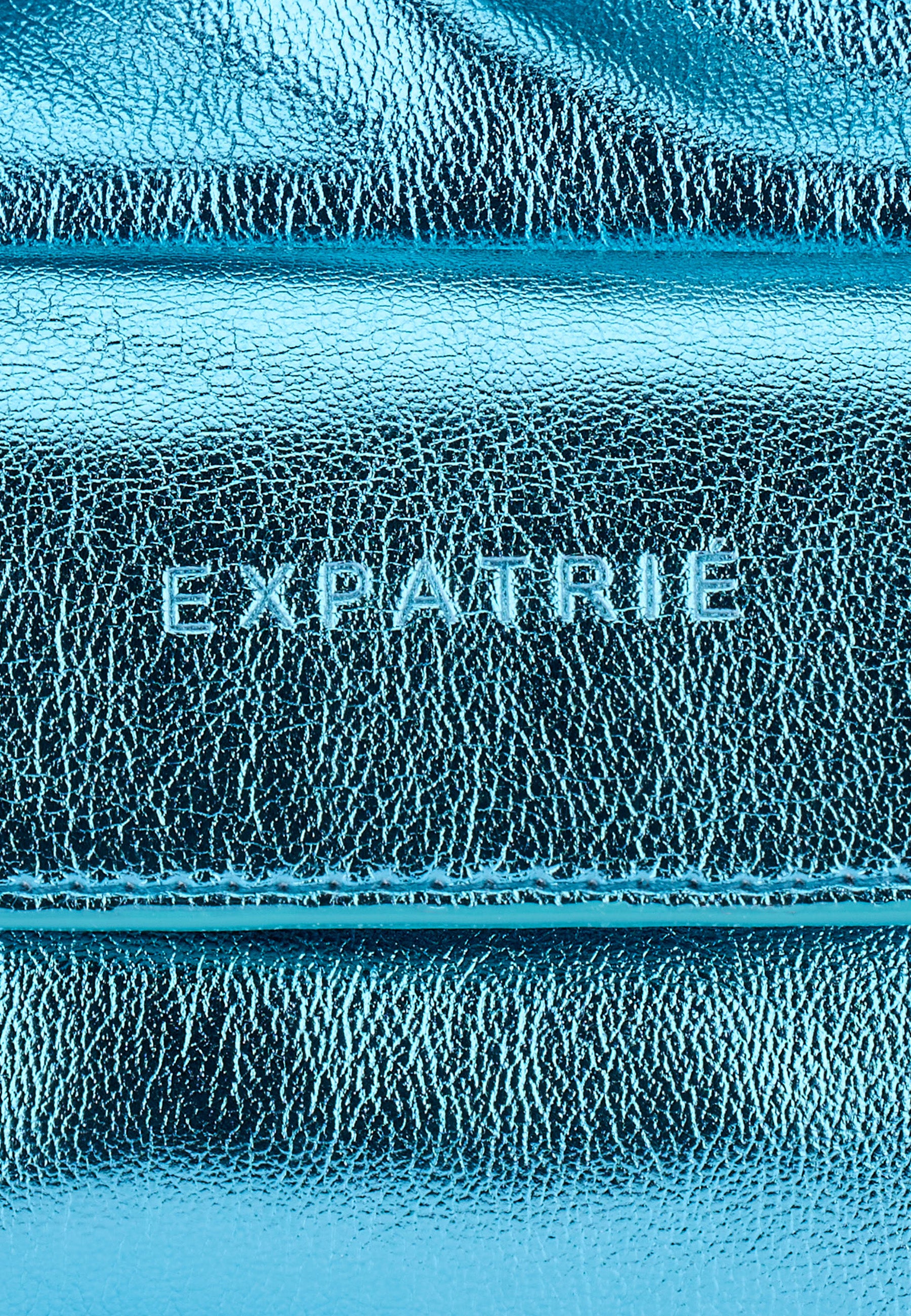 Metallisch blaue EX-PATRIÉ Handtasche mit sichtbarer Ledernarbung