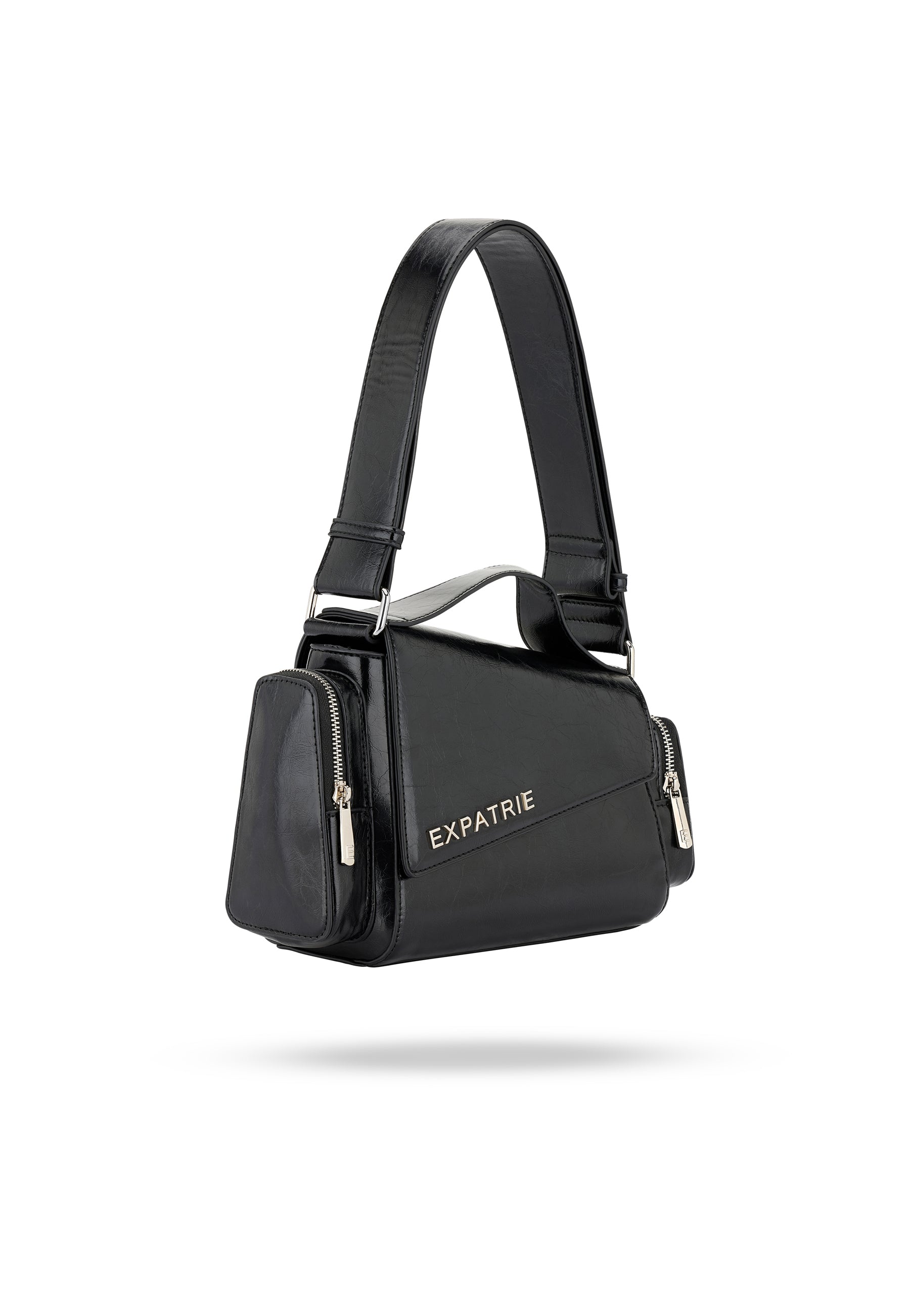 Schwarze Vintage-Style Handtasche der Marke Expatrié mit breitem Tragehenkel und seitlichen Reißverschlusstaschen