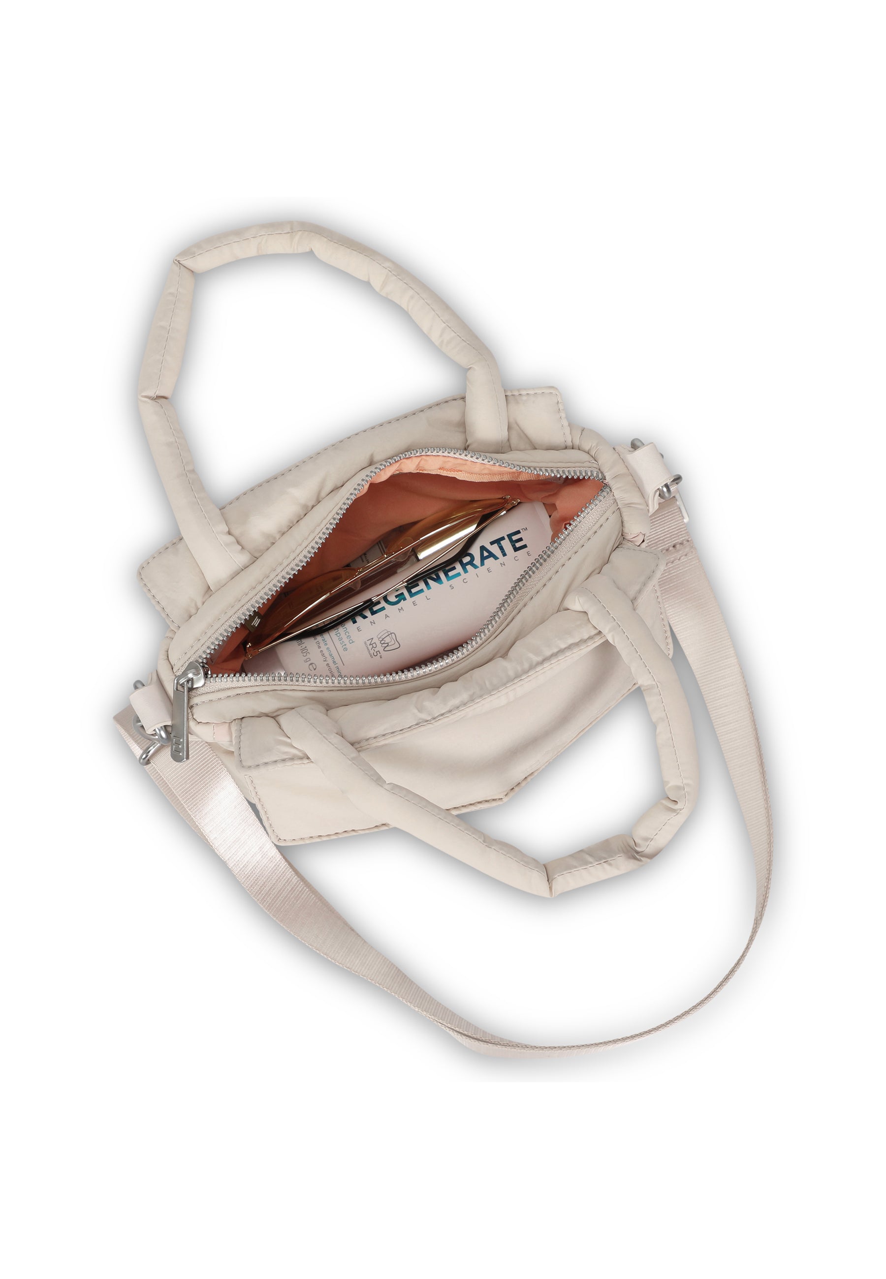 Beige Damenhandtasche Poppy Small geöffnet mit sichtbarem Inhalt innen