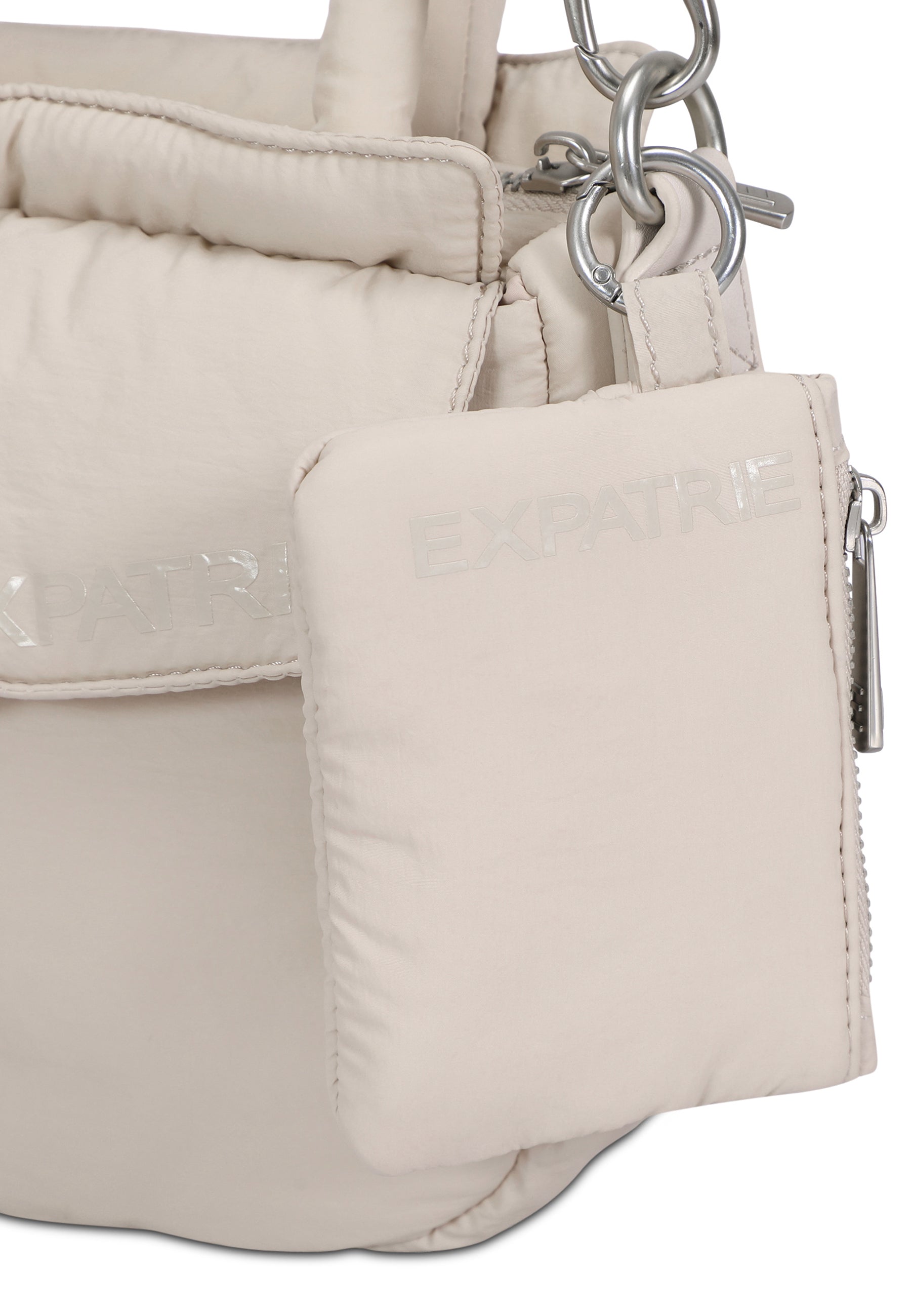 Beige CHERRY Mini Pochette von Expatrié aus weichem Material mit Reißverschluss und Metallkarabinern