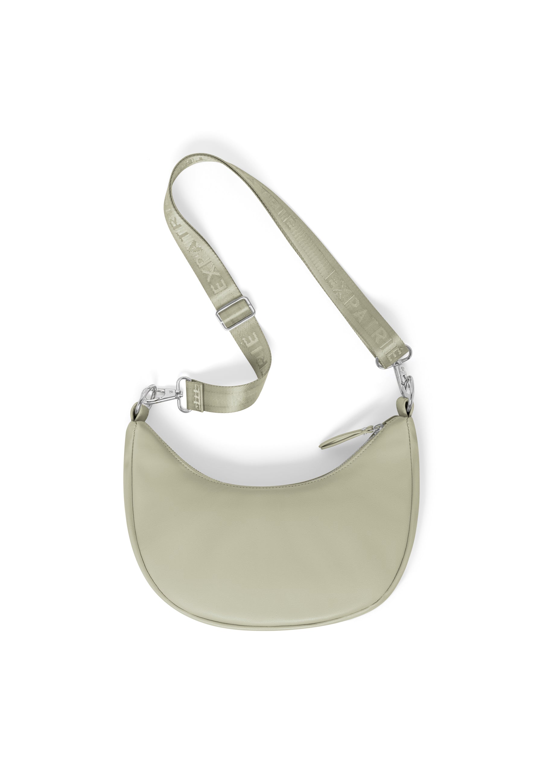 Kleine LEA HALF MOON Tasche in blassem Grün mit verstellbarem Träger mit Prägung