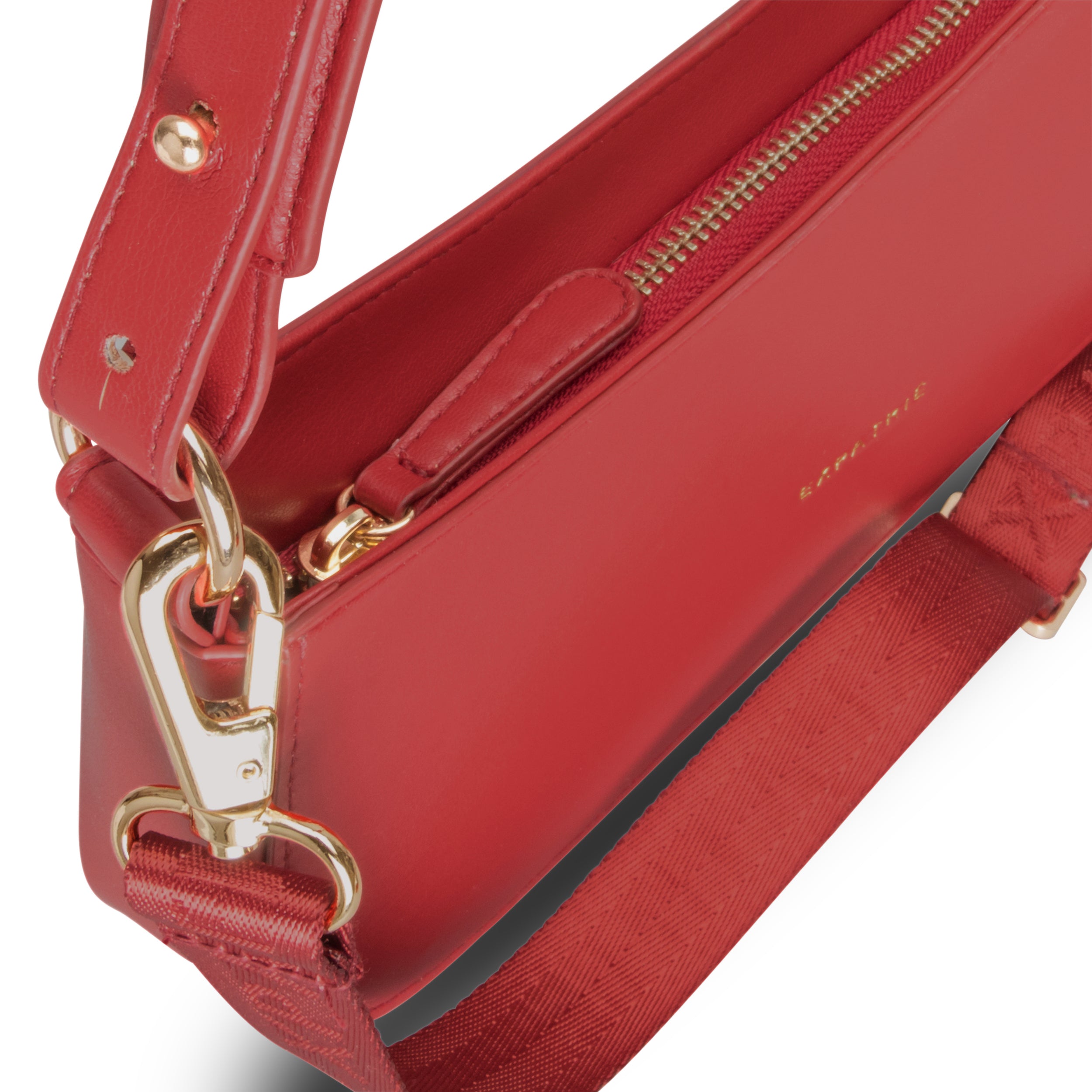 Handtasche Féline aus rotem Leder mit goldfarbenem Metallverschluss und verstellbarem Schultergurt