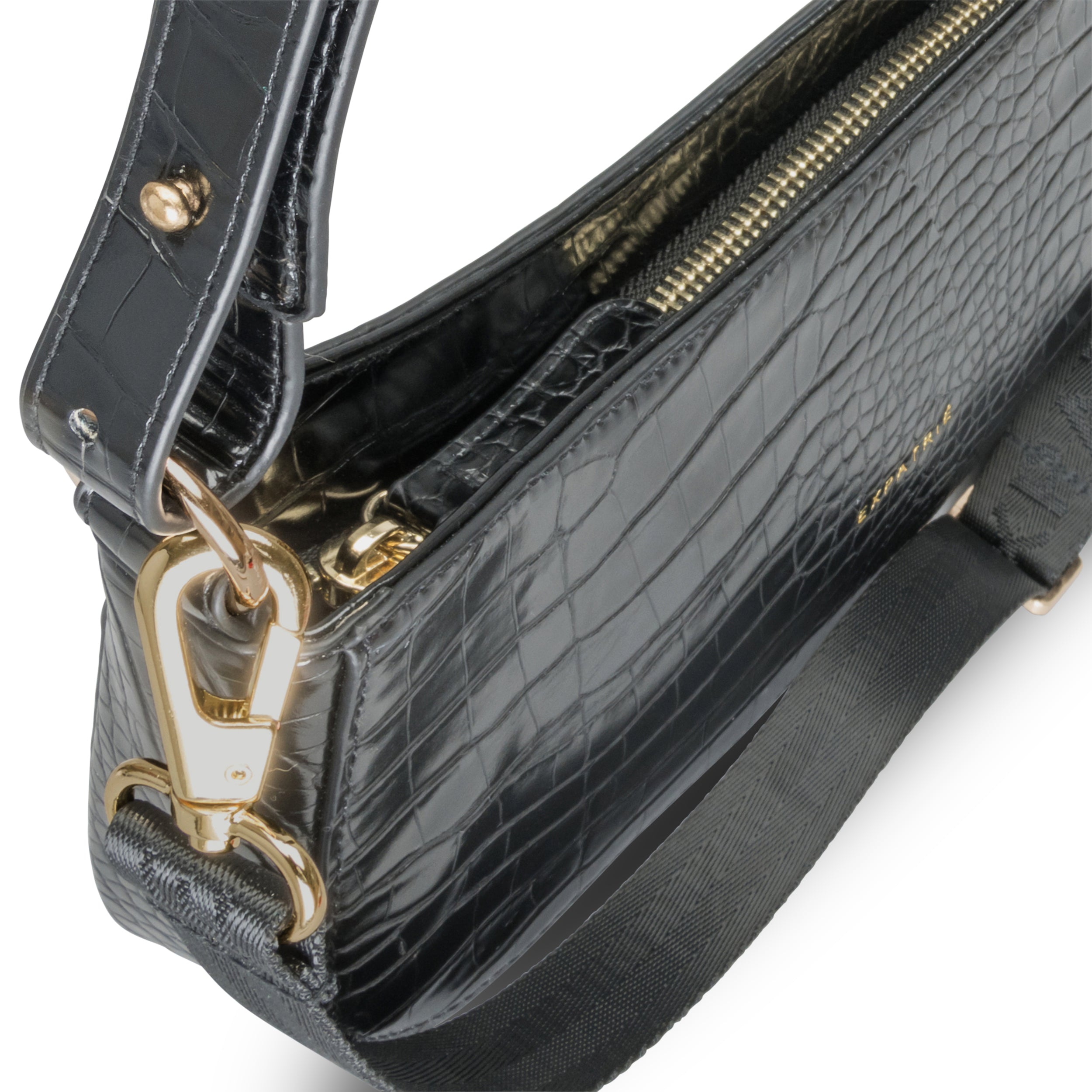 Schwarze Handtasche Féline aus krokodilgeprägtem Leder mit goldfarbenen Metallakzenten und verstellbarem Schulterriemen
