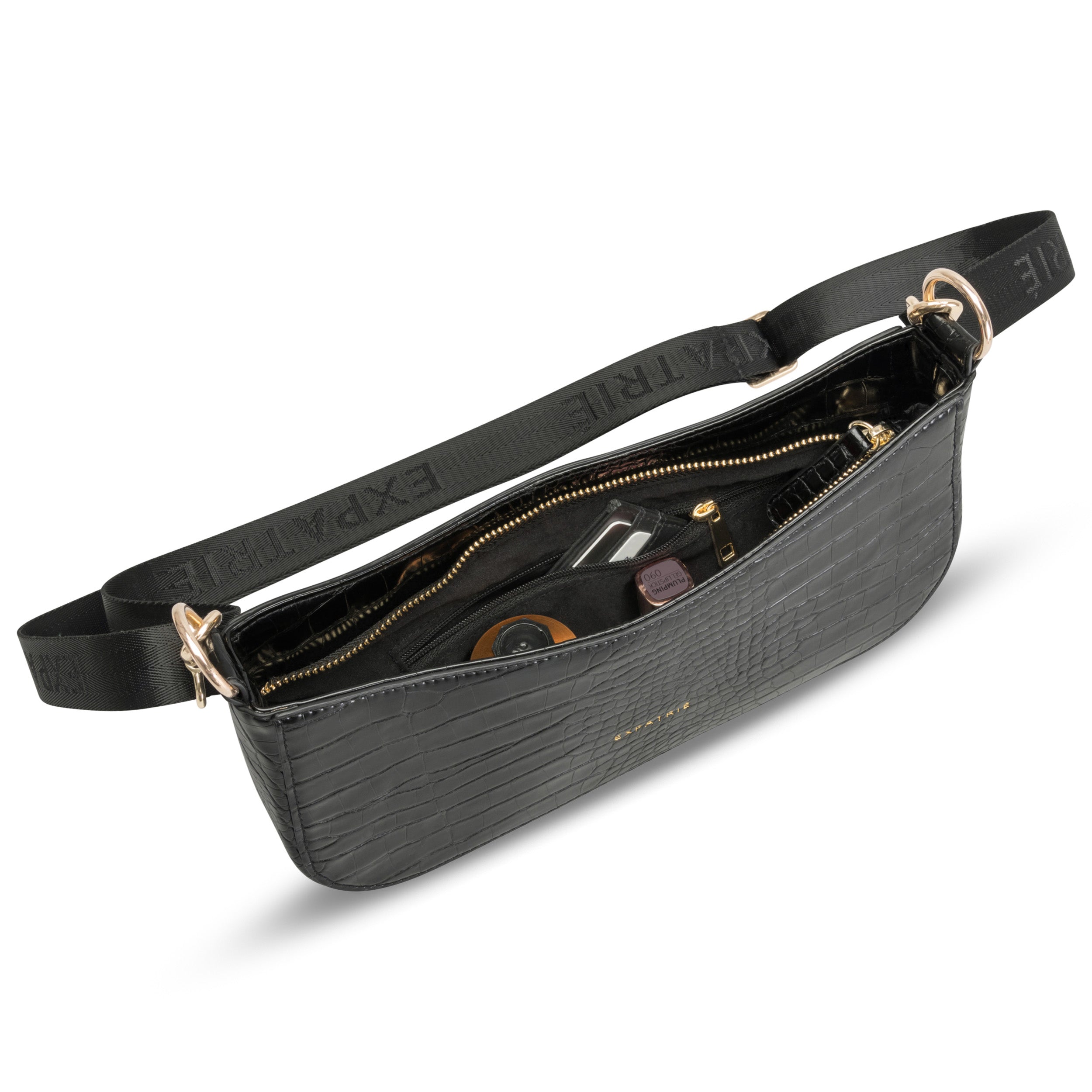 Schwarze kleine Schultertasche Féline mit Krokodillederstruktur, goldfarbenen Reißverschluss und verstellbarem Gurt mit 'Expatrié'-Schriftzug