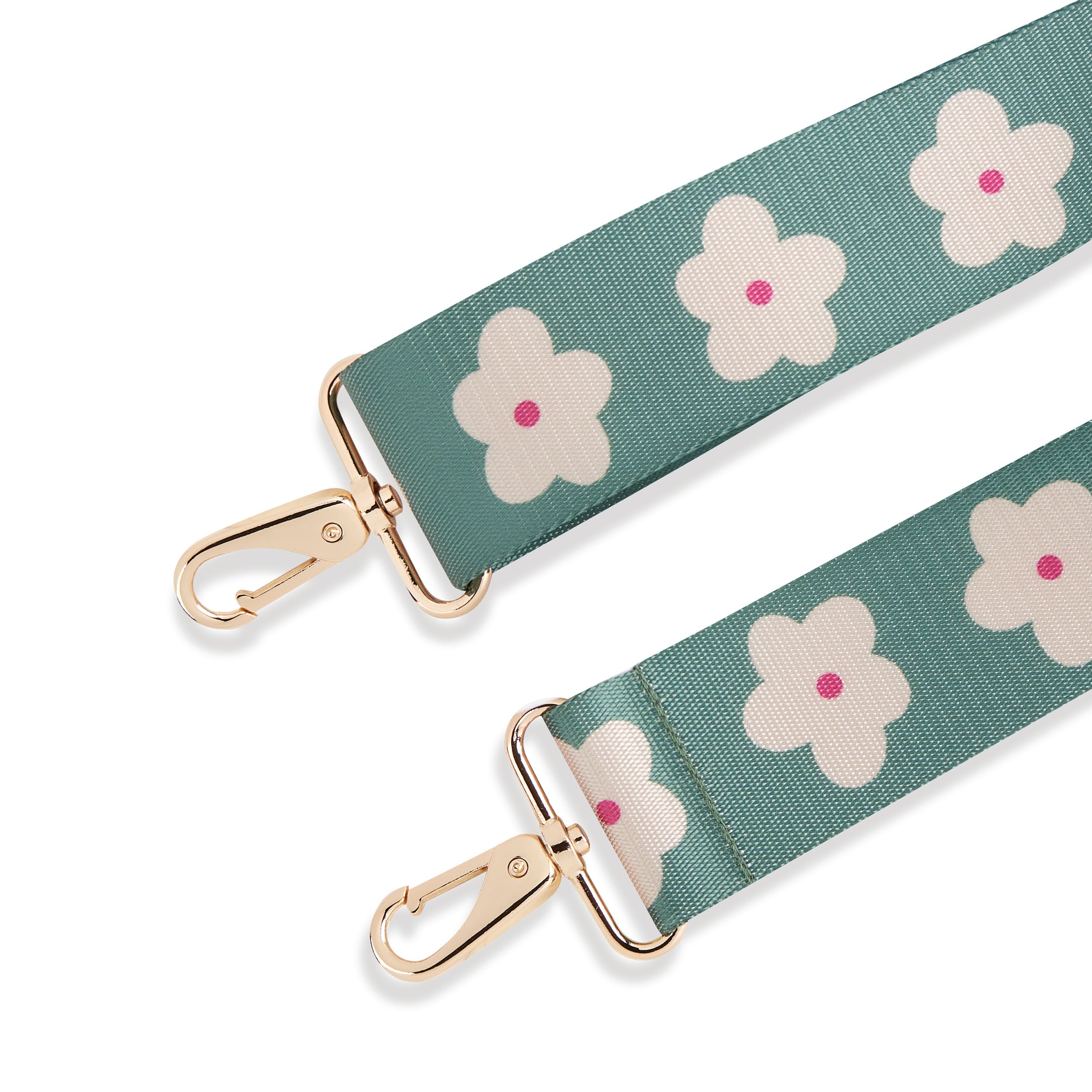 Grüner Taschenriemen mit weißen Blumen und rosa Punkten, goldfarbene Karabinerhaken
