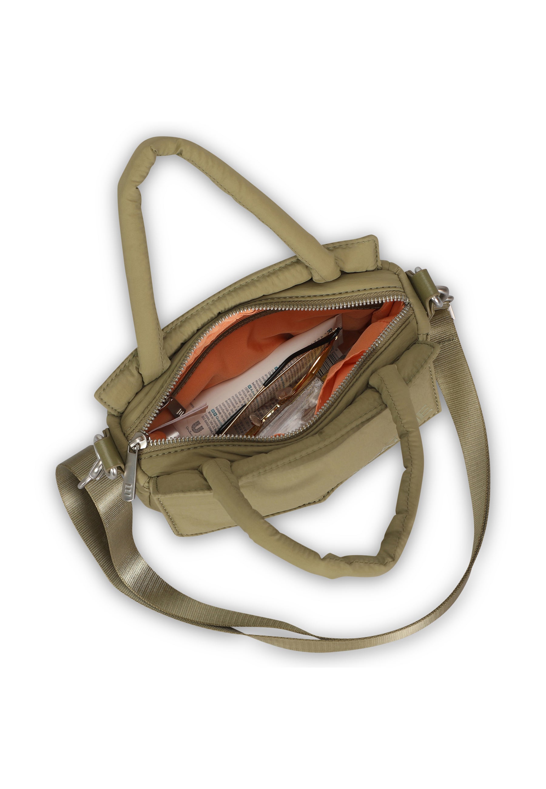 Kleine olivgrüne Poppy Small Handtasche mit Reißverschluss geöffnet, zeigt orangefarbenes Innenfutter und Inhalt