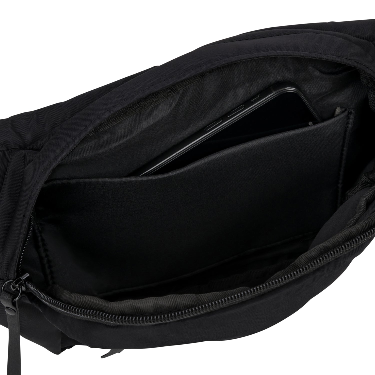 Innenansicht der Bauchtasche Justine mit einem Smartphone in einem Fach