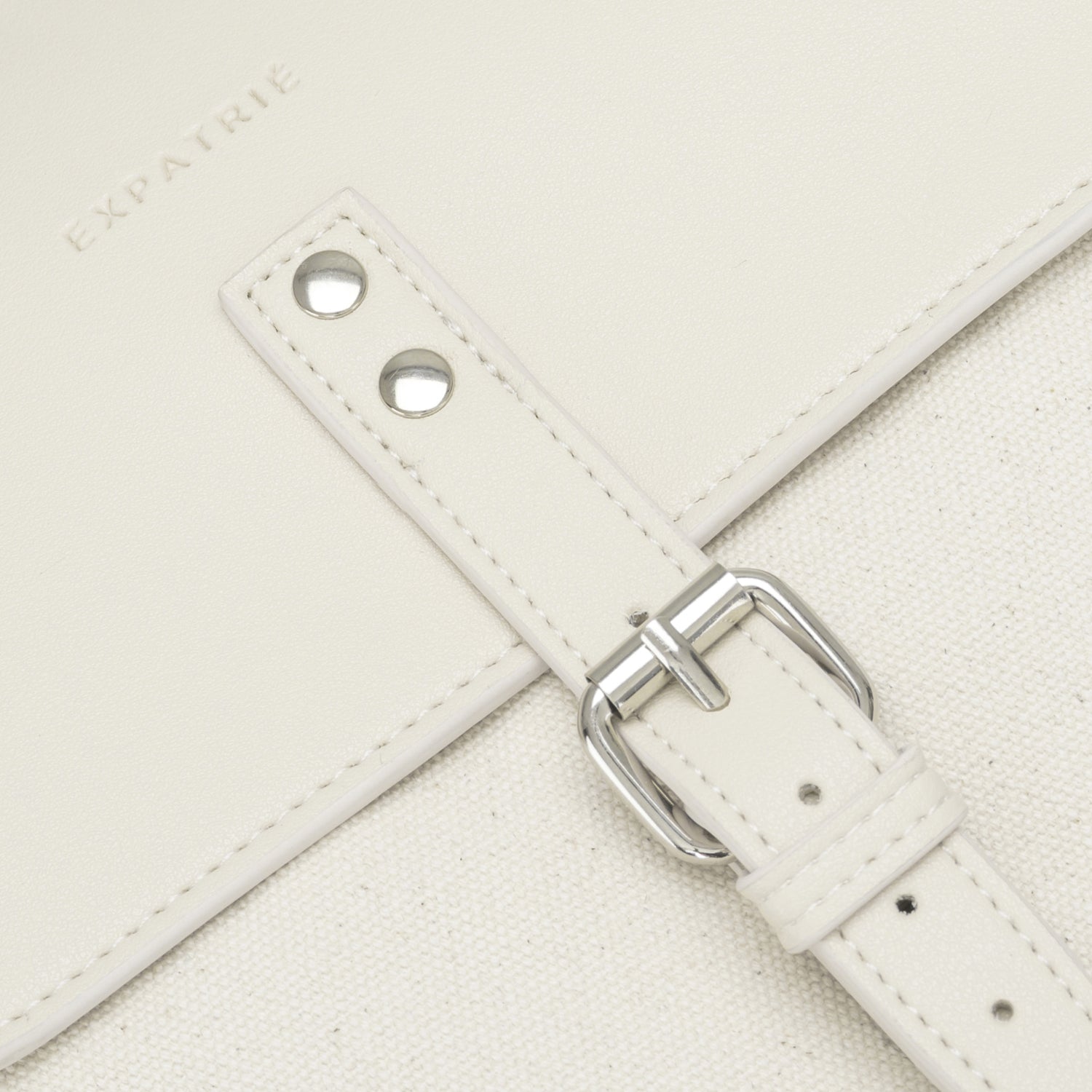 Offwhite Mini-Rucksack Anna aus Canvas und Leder mit silberner Schnalle